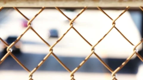 Traffic Thru Fence Video stock 48367013