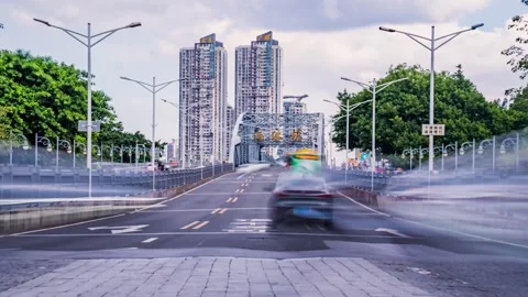 Traffic timelapse approaching Haizhu Bridge steel arch in Guangzhou China Stock Footage 346030674