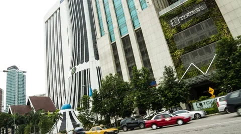 Traffic Timelapse In Front of Tabung Haji Tower in KL, Malaysia Stock Footage 49767172