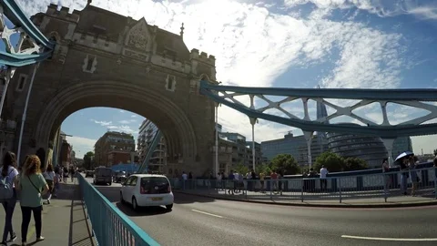 Traffic on Tower bridge. Tower Bridge is an iconic symbol of London Stock Footage 79506763