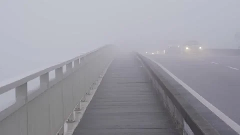 Traffic trough fog Video stock 163557261