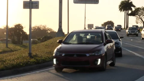 Traffic Turns from Turnpike Overpass Stock Footage 200799498