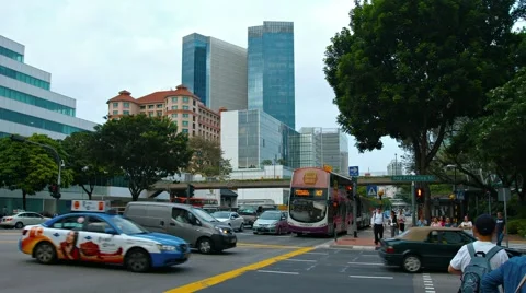Traffic at a typical urban intersection in Singapore. Video 1080p Stock-Footage 63474627