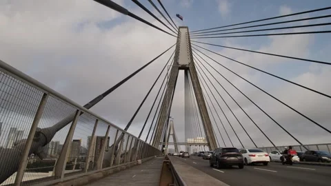 Traffic under Australian flag on Anzac bridge slow motion 4K Stock Footage 268158735