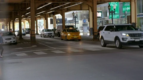 Traffic under the L train, in Chicago, Illinois Stock-Footage 92360523
