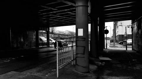 Traffic under a railway bridge Stock Footage 171798884