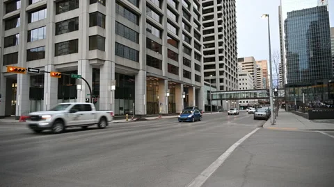 Traffic in a urban intersection Stock Footage 169417806