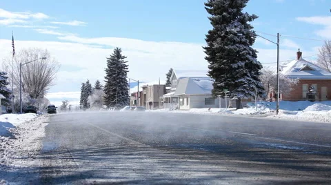 Traffic winter small town cold rural town center HD Stock Footage 1089768