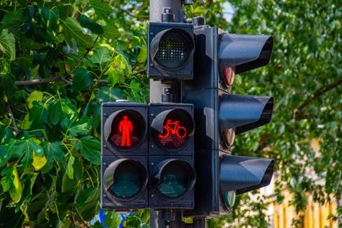 Trafic light showing red light for walkers and bycicles Stock Photos