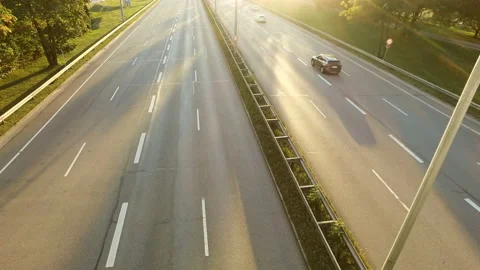 Trafific on a highway at sunset in Munich Stock Footage 135987201