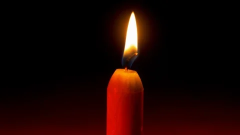 Tragic single Candle stable flame on black background with red gradient Stock Footage 122862718