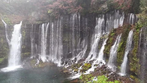 Traight On | Shiraito Falls | Water Cascades - 4K Aerial Video Stock Footage 329055752