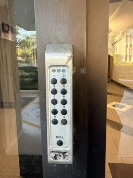 Traight-On View of Entry Keypad at Building Door Stock Photos
