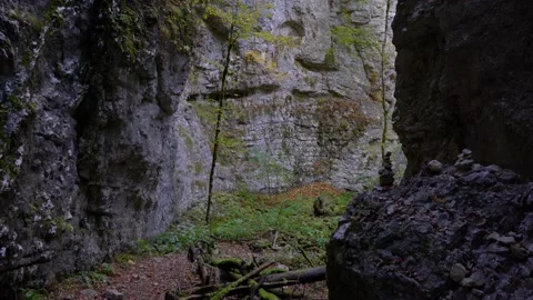 Trail between two huge limestone rocks Stock Footage 167587041