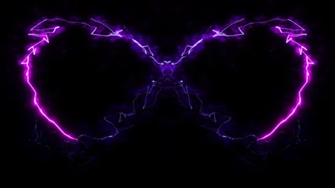 A trail of colored particles writing out figures on a black background 1 Stock Footage 302811875