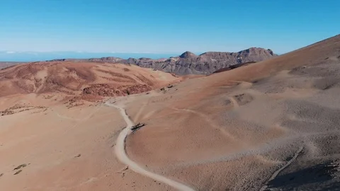 The trail at the foot of the volcano in the middle of the desert, view from the Stock Footage 111246883