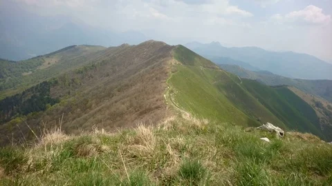 Trail on hills facing the lake of Como in Italy. Stock Footage 79656366