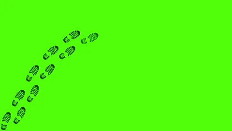 Trail of human footprints on green screen. Black silhouettes of human shoeprints Video stock 242201290