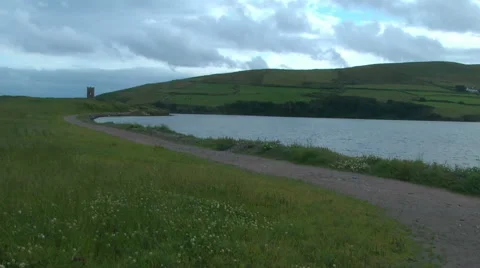 Trail leading around Dingle Bay in Ireland Stock Footage 40299608