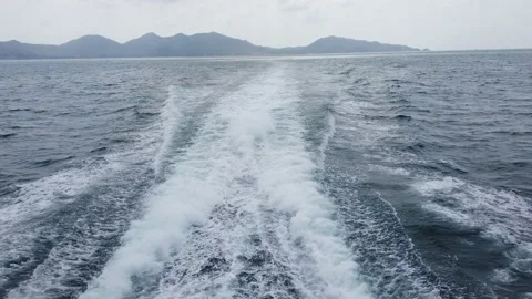 The trail left behind by the speedboat Stock Footage 140872958
