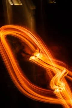 Trail of Light and Fire in Motion Stock Photos