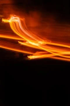 Trail of Light and Fire in Motion Stock Photos