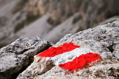 Trail mark on a stone Stock Photos