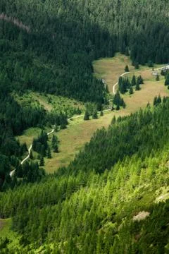 Trail in mountain valley Stock Photos