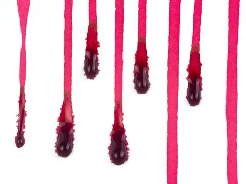 Trail of Red paint dripped down on white background, blood and danger concept Stock Photos