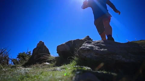 Trail runner jumps over camera Video stock 50958032