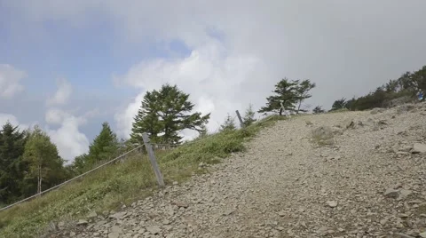 Trail runner at Mount Daibosatsu in summer, Yamanashi Prefecture Stock Footage 58466683