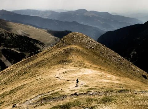 Trail Runner in the Mountains Stock Photos