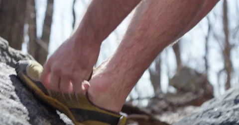 Trail Runner Ties Shoe 4K Stock Footage 50931076