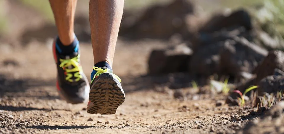 Trail running athlete Stock Photos