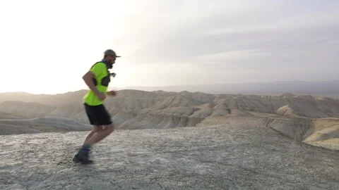 Trail running in the desert Stock Footage 105862754