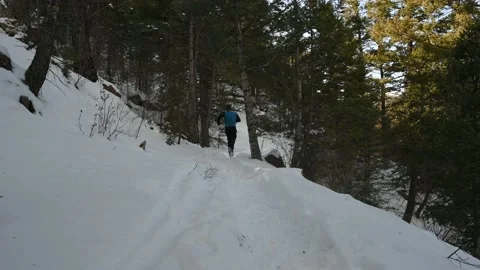 Trail Running in Winter on Snow Stock Footage 148238314