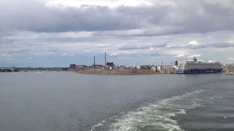 Trail of the ship (ship wake) against the backdrop of the port of Helsinki Stock Footage 95432037