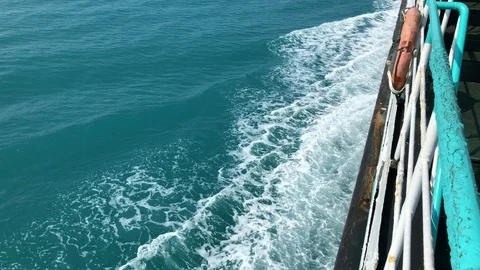 Trail from the ship on the water Vídeos de archivo 107075625