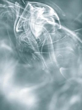 Trail of smoke on a dark background - creative colour effects with smoke smud Stock Photos