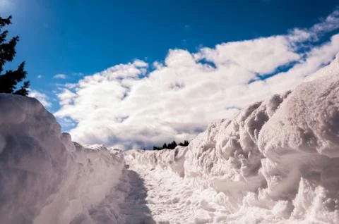 The trail through the snow to the sky Stock Photos