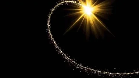 A trail of twinkling golden light forms a heart against a pitch-black background Stock Footage 328460670