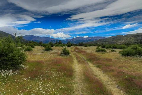 Trail in the valley. Stock Photos