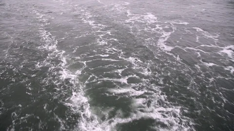 Trail on the water after passing the ship. Stock Footage 89354058