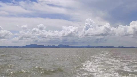 Trail on water surface behind of fast moving or sailing ship or boat. buildin 스톡 동영상 168568492