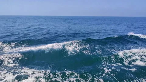 Trail on water surface on side of fast moving or sailing ship or boat Stock Footage 168568539