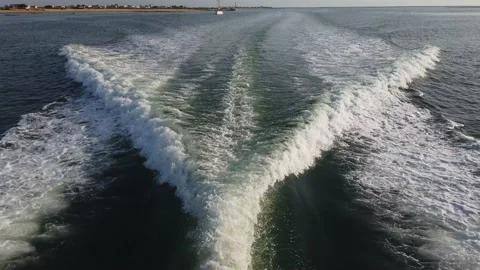 Trail of waves behind a motor boat. Yacht trace Stock Footage 136429003