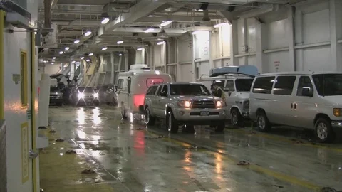 Trailer being backed into space on Alaskan ferry. Stock Footage 79418374