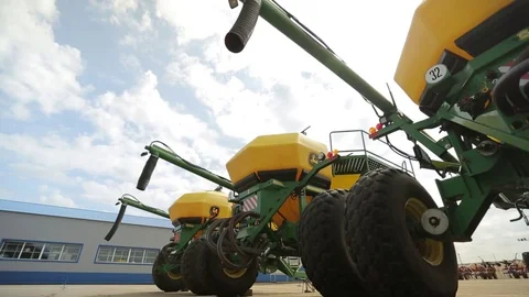 The trailer combines with the screw tubes are parked for agricultural machinery Stock Footage 73953439