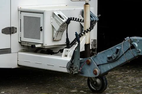 Trailer coupling and electrical connections in parking area Stock Photos