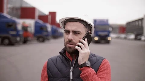 Trailer driver with hard hat and safety vest. Close up portrait of worker Stock Footage 111484413